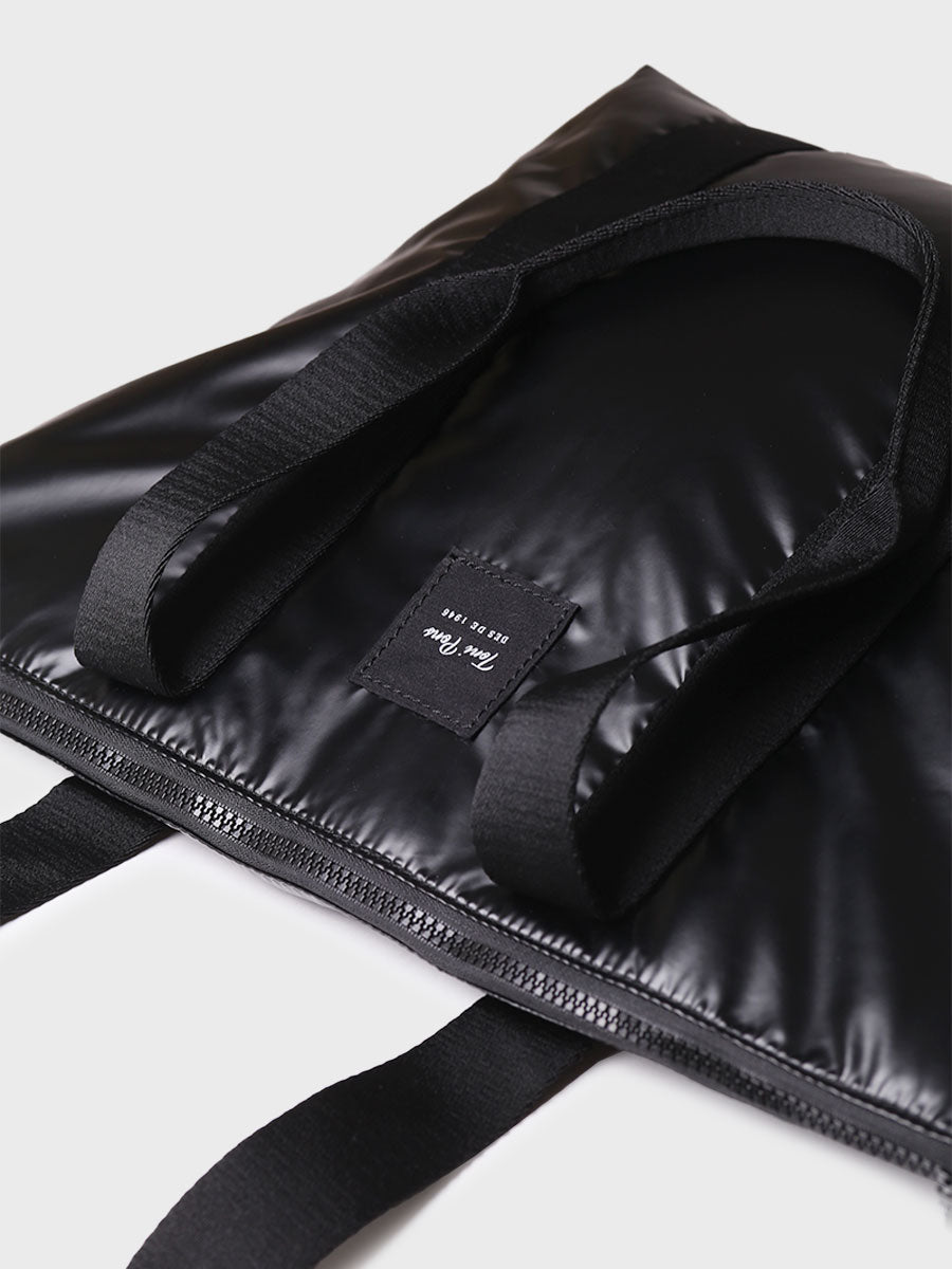 Bolso para mujer en material acolchado brillante | GINNY