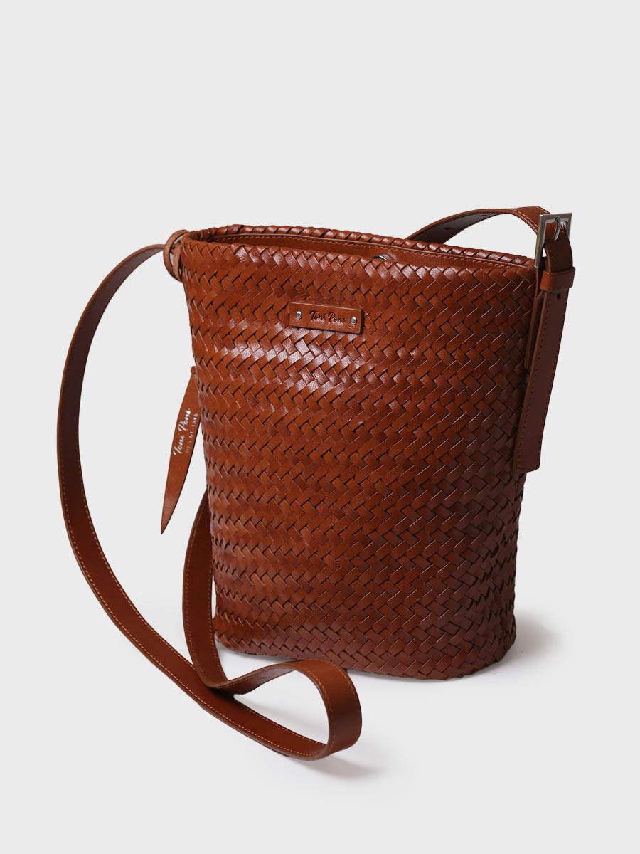 Bolso bombonera en cuero trenzado con tira ajustable | SALLY